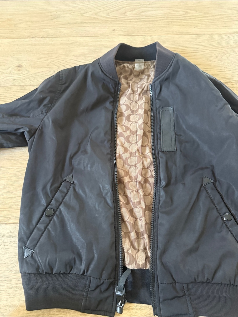 Coach Black Bomber Jacket with Signature Tan Lining